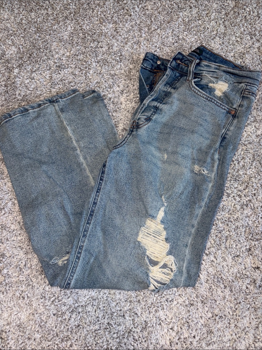 Distressed Blue Denim Jeans